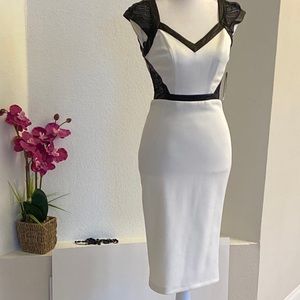 ⛩ XOXO Off White and black faux leather dress